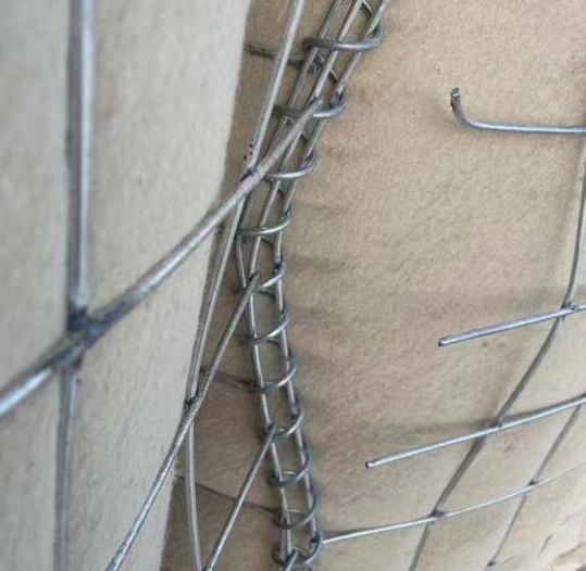 Poor quality HESCO barrier with broken welds